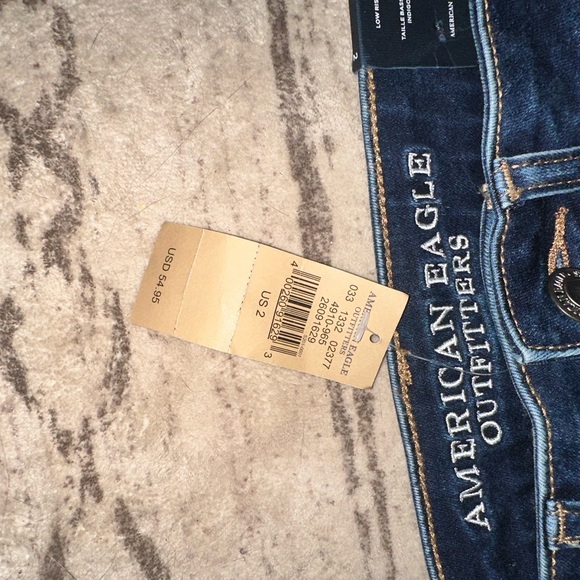 American Eagle Next Level Stretch Hi Rise Shortie Distressed Denim Shorts - Picture 2 of 4